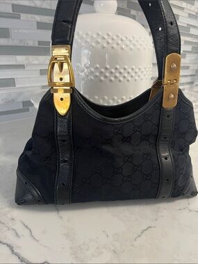 Gucci Black Shoulder Bag with Gold Hardware and Monogram Canvas